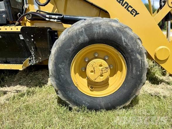 CAT 416 Товарач със заден ексватор