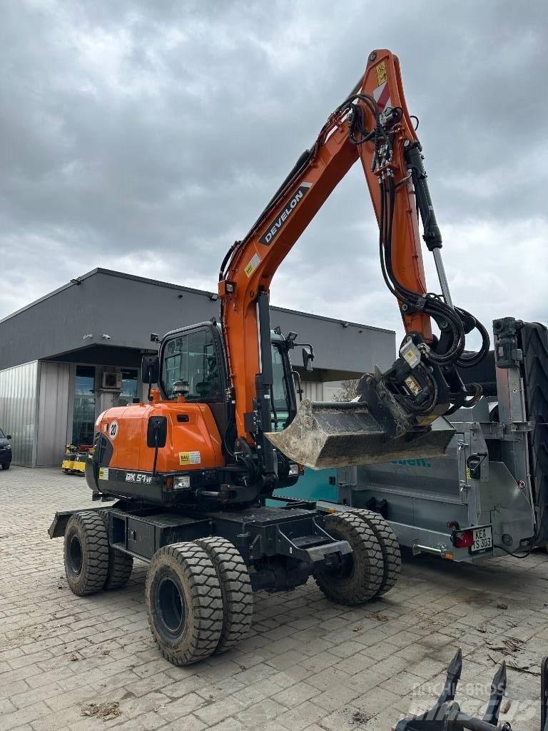 Develon DX 57 W-7 Колесни екскаватори