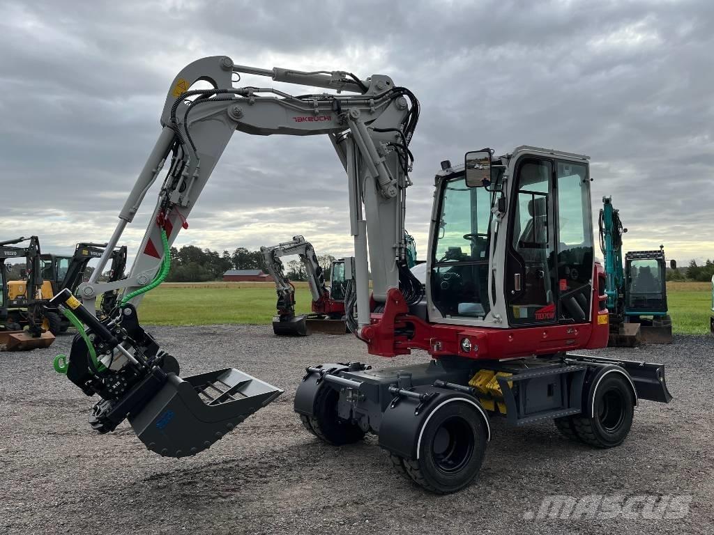 Takeuchi TB 370 W Колесни екскаватори