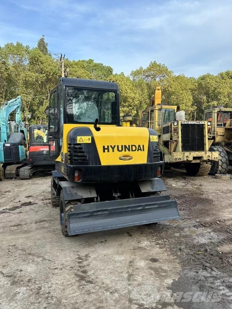 Hyundai 60 W-7 Колесни екскаватори