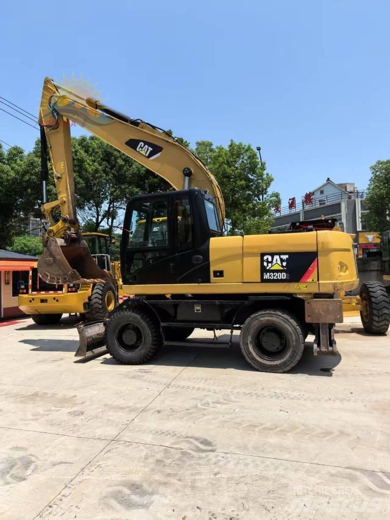 CAT M 315 D2 Колесни екскаватори