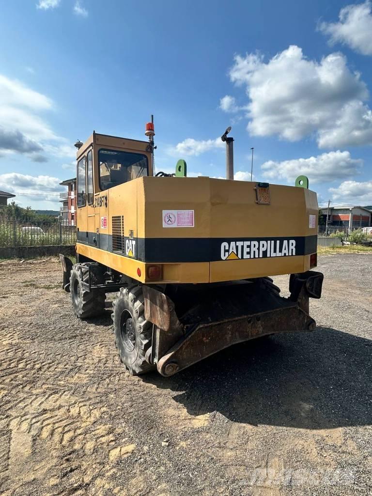 CAT 214 Колесни екскаватори