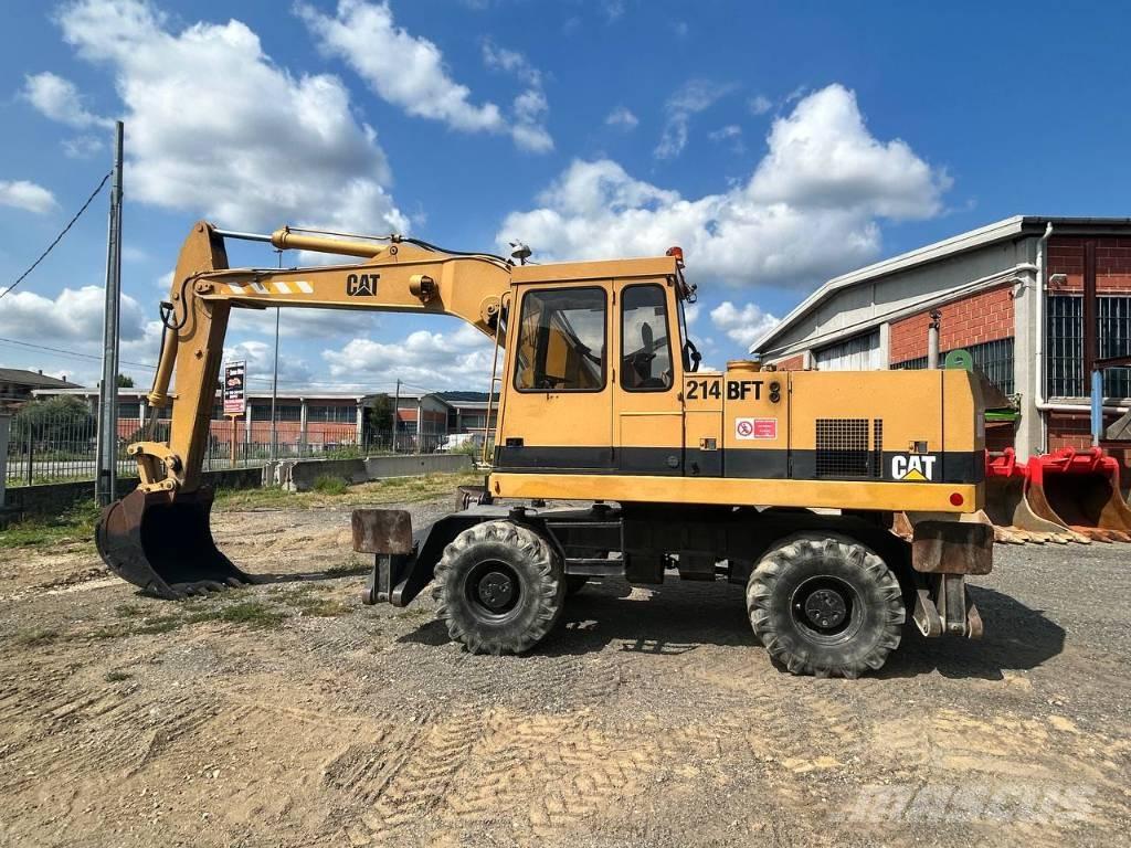 CAT 214 Колесни екскаватори