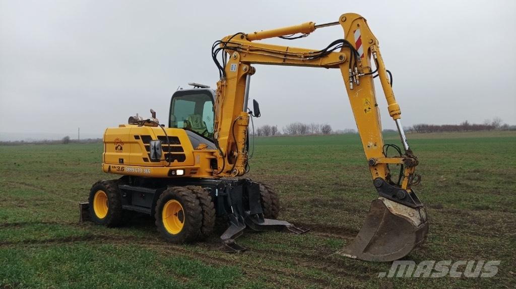 New Holland MH 3.6 Колесни екскаватори