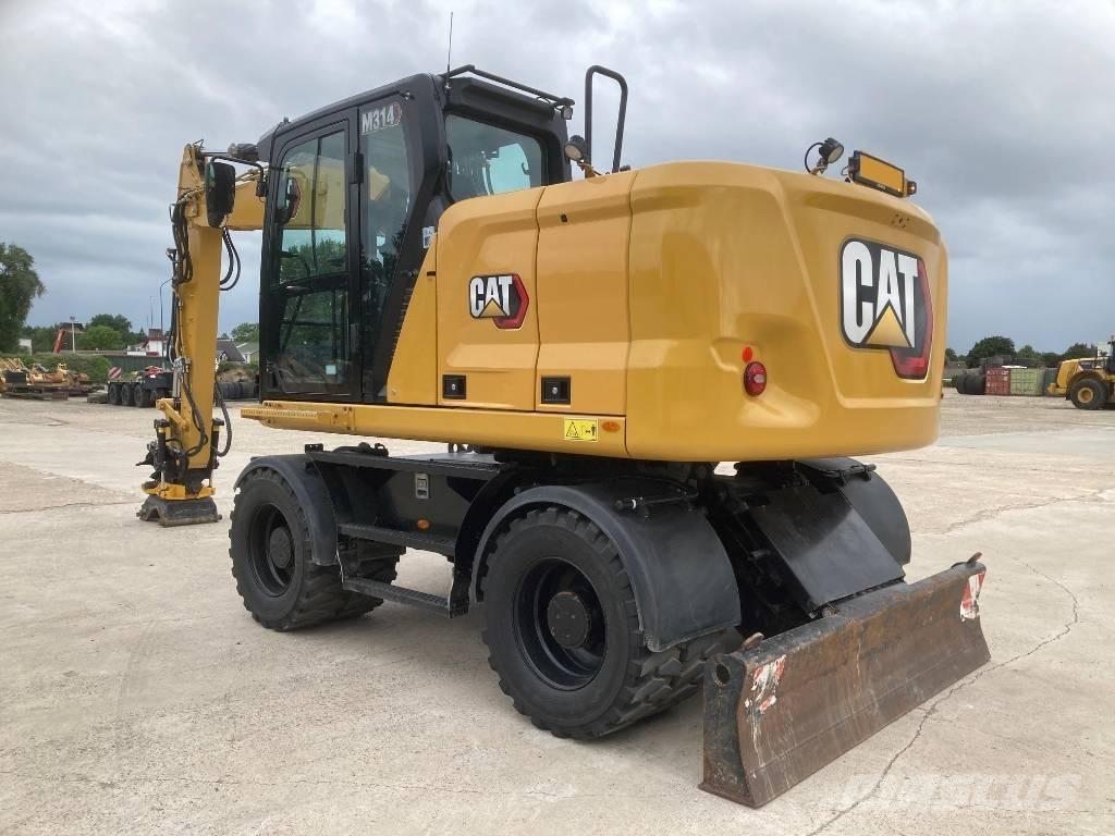 CAT M 314 Колесни екскаватори