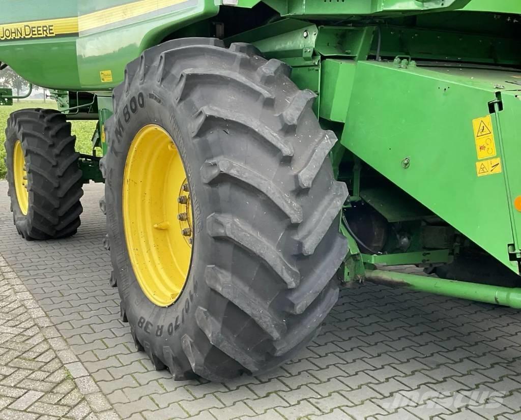 John Deere T 560 Комбайни