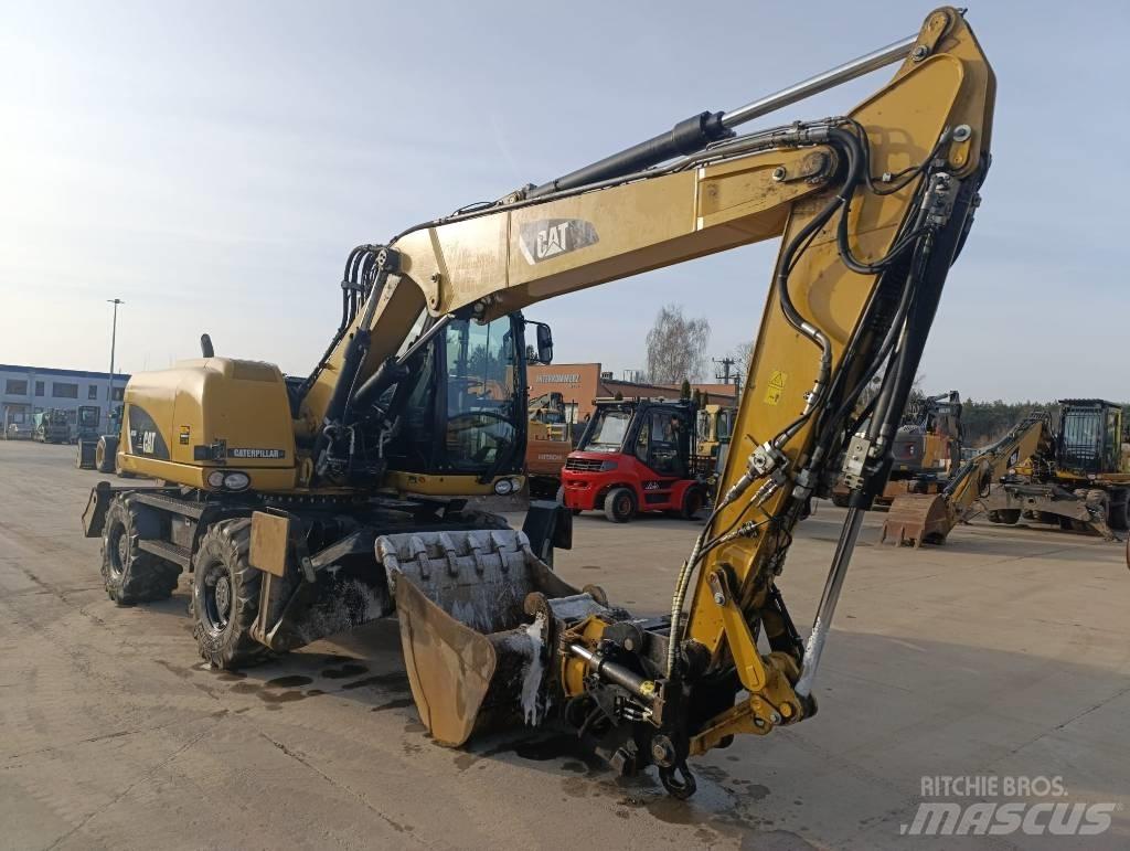 CAT M 313 D Колесни екскаватори