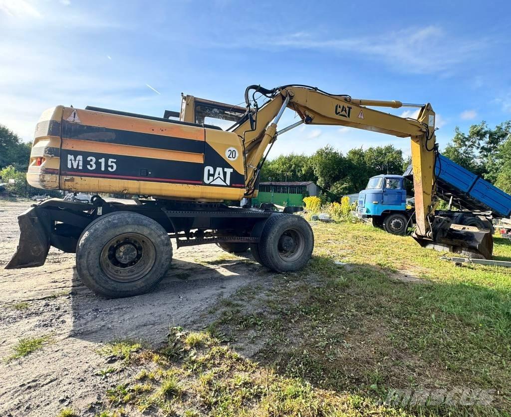 CAT M 315 Колесни екскаватори
