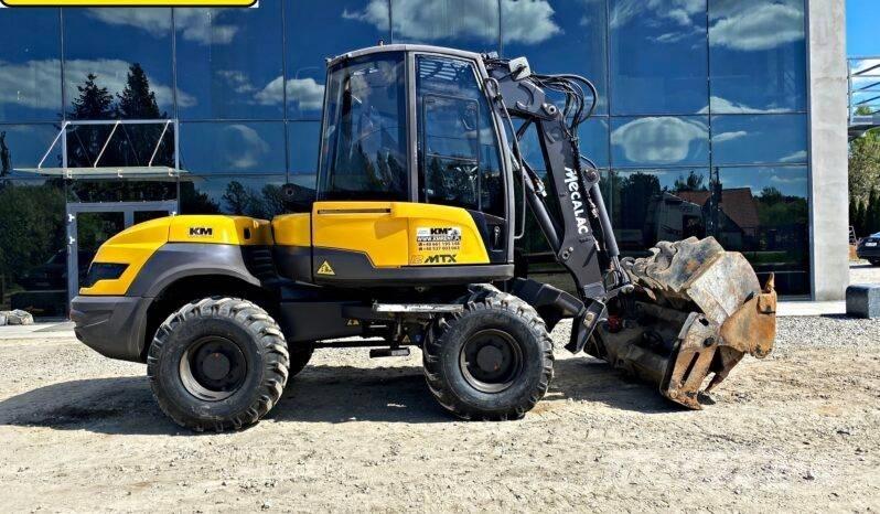Mecalac 12 M TX Товарач със заден ексватор