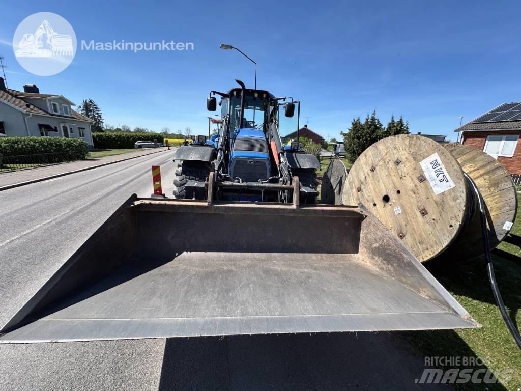 Huddig 1260 C Товарач със заден ексватор