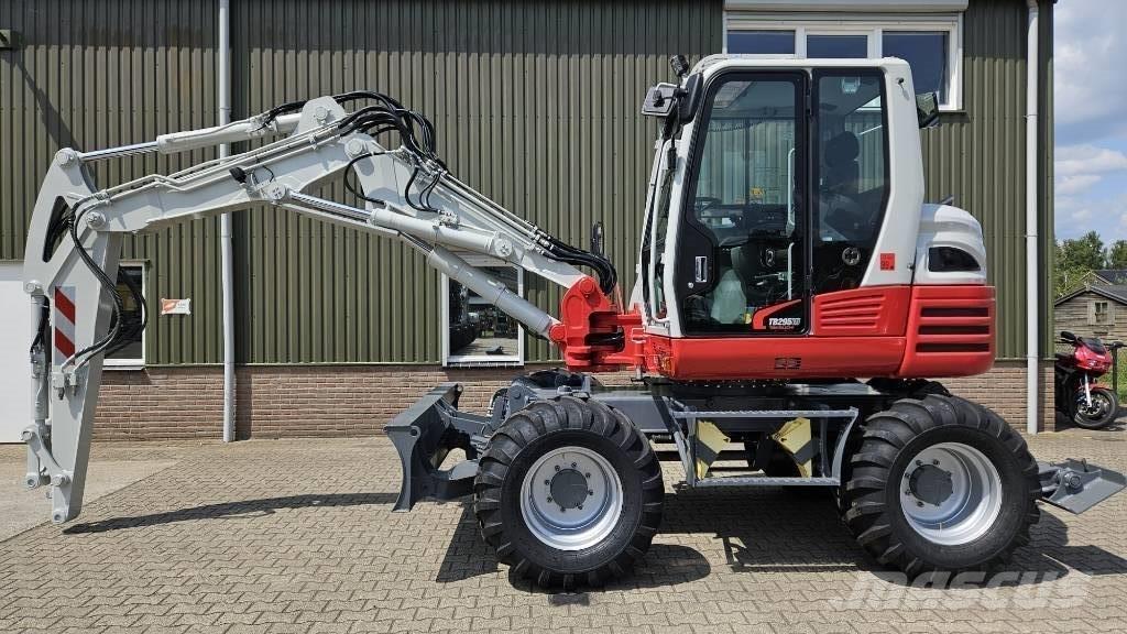 Takeuchi TB295W Колесни екскаватори