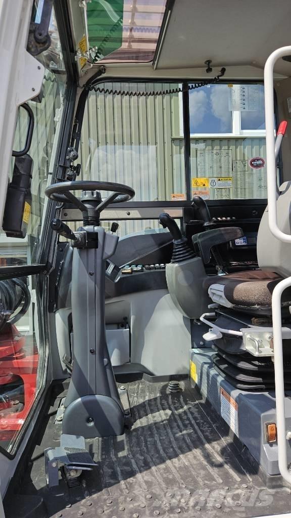 Takeuchi TB295W Колесни екскаватори