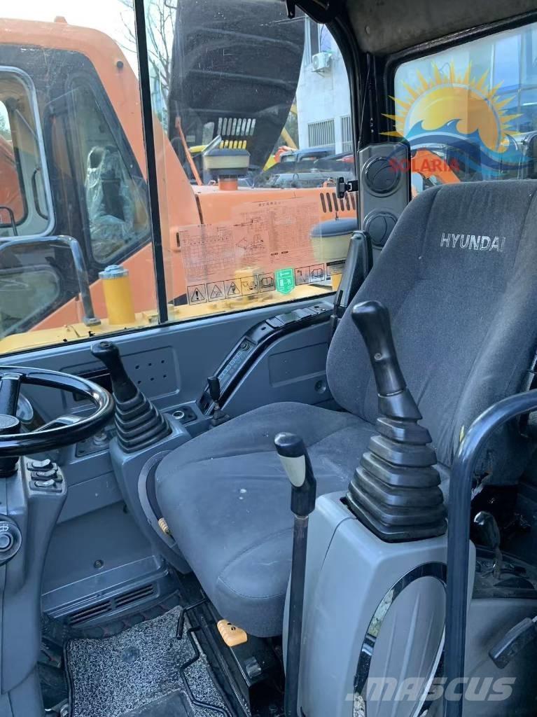 Hyundai R60W HW Колесни екскаватори