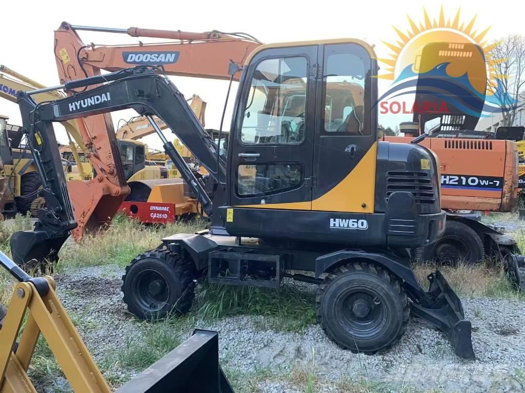Hyundai R60W HW Колесни екскаватори