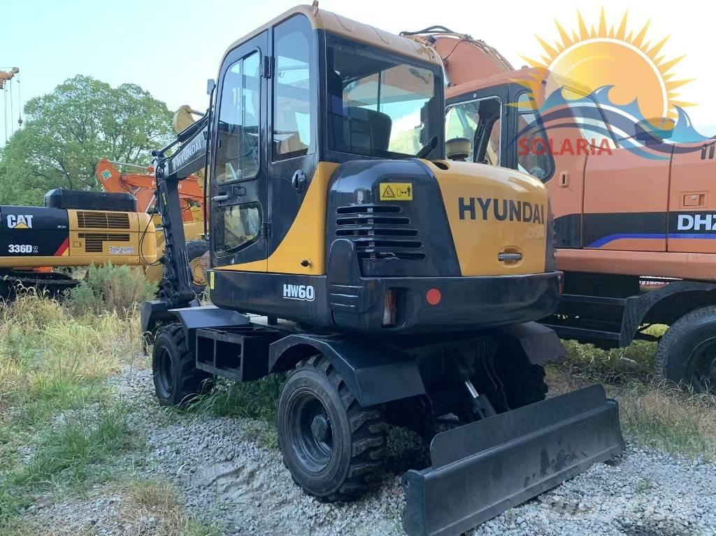 Hyundai R60W HW Колесни екскаватори