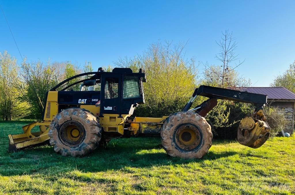 CAT 545 C Скидери
