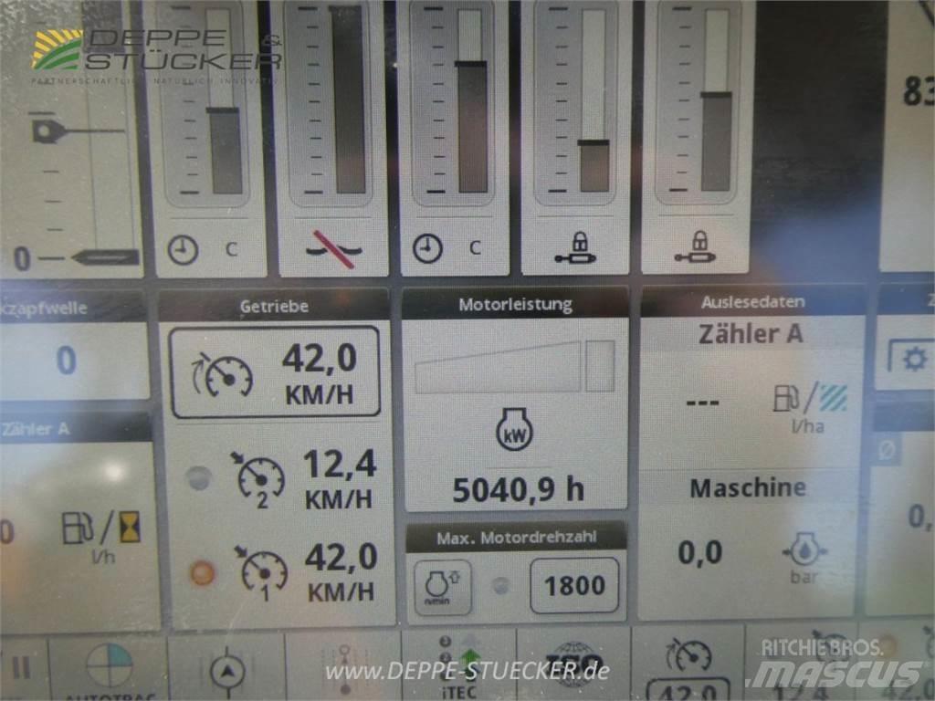 John Deere 6215R Трактори