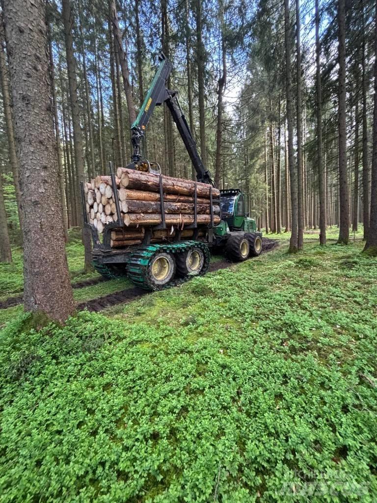 John Deere 1110E Форуардери
