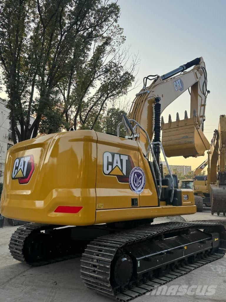 CAT CAT323 Средни екскаватори 7т - 12т