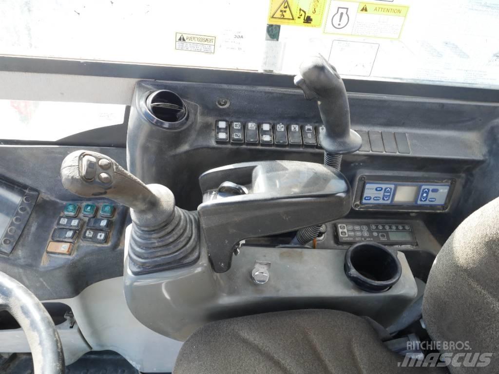 Takeuchi TB 295 W Колесни екскаватори