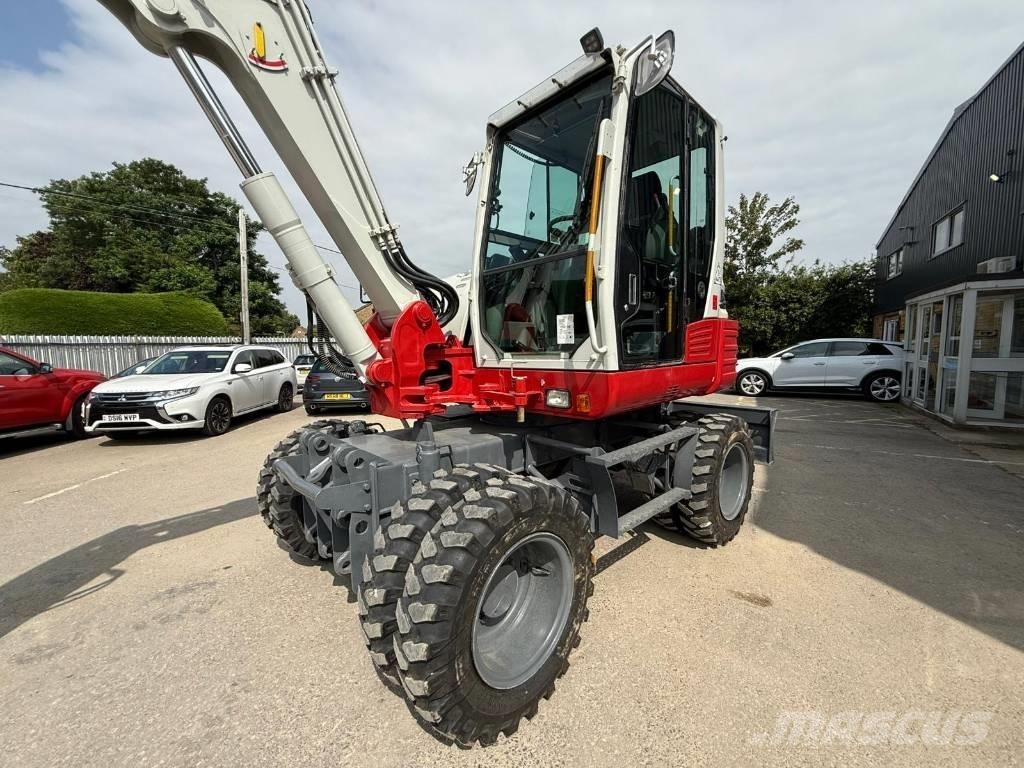 Takeuchi TB 295 W Колесни екскаватори
