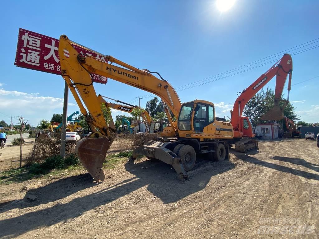 Hyundai 210w Колесни екскаватори