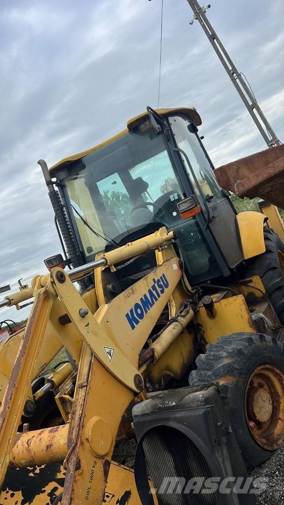 Komatsu WB 93 R Оси

