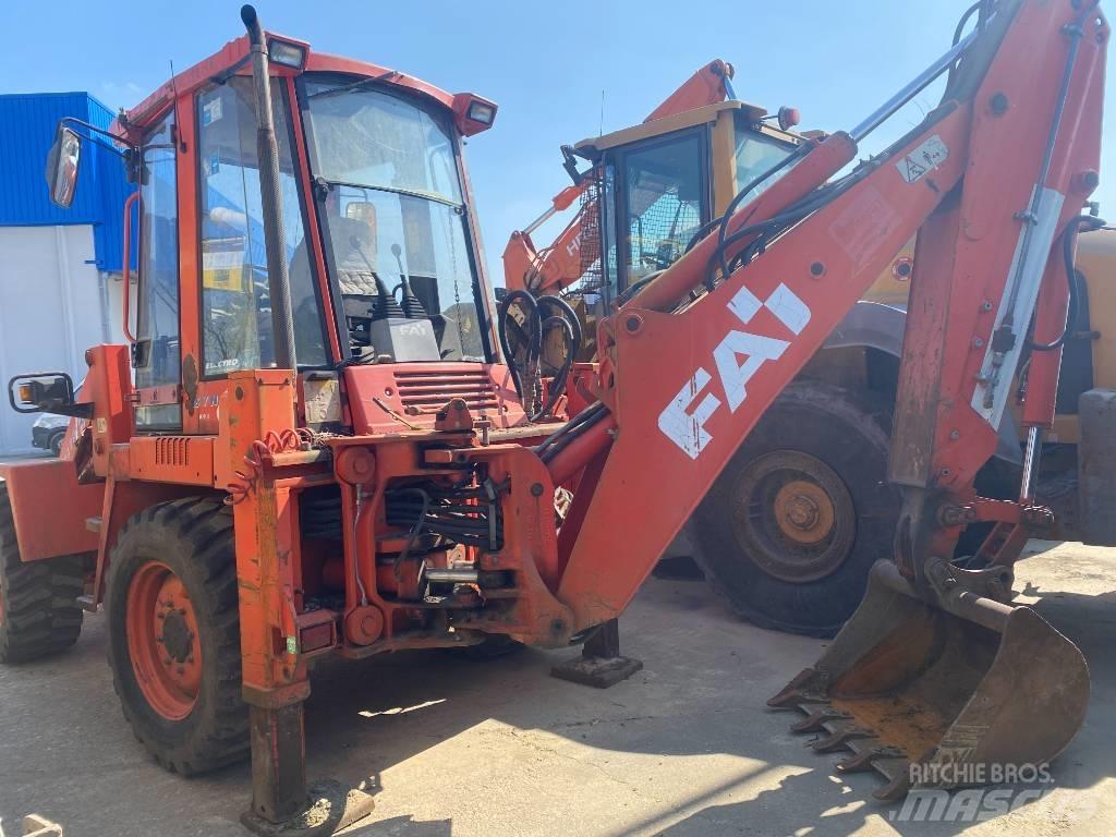 Fai KOMATSU 595s Товарач със заден ексватор