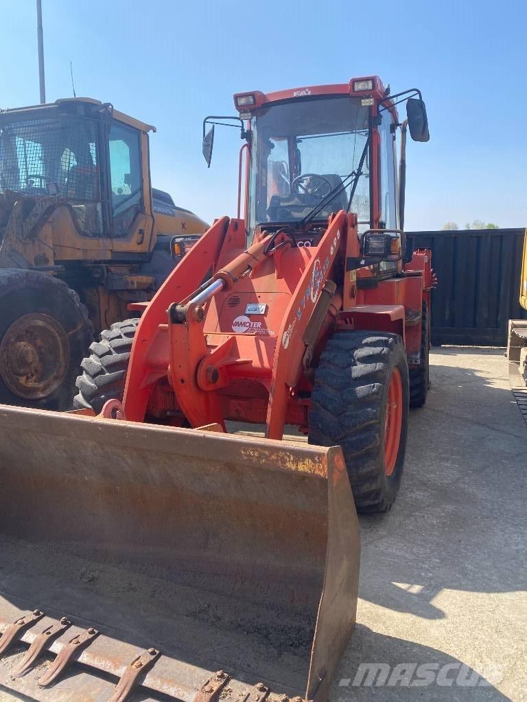 Fai KOMATSU 698 Товарач със заден ексватор