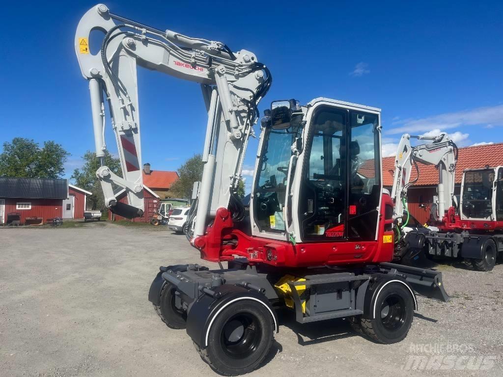 Takeuchi TB 370 W Колесни екскаватори