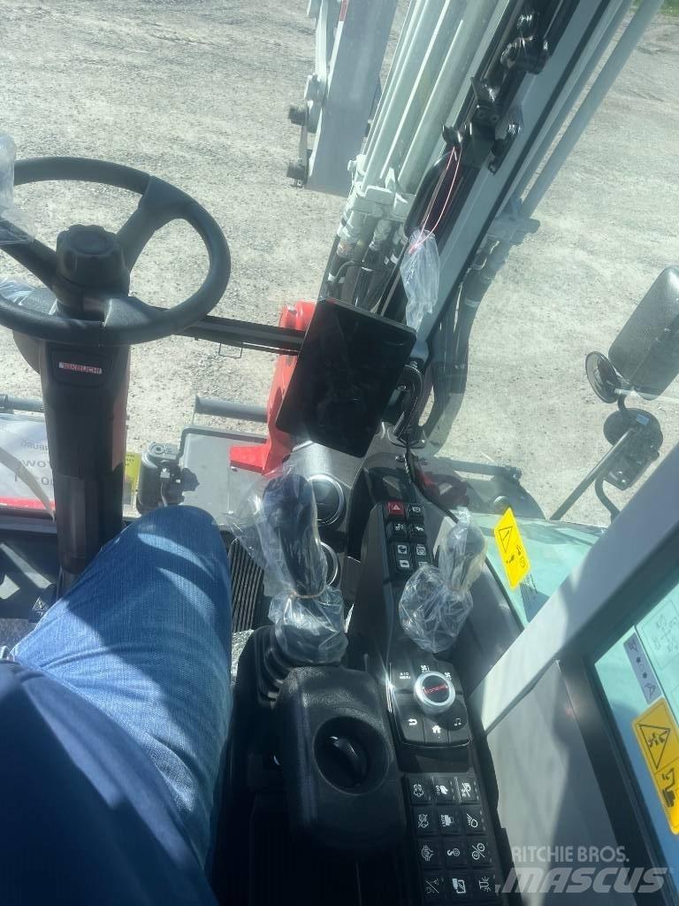 Takeuchi TB 370 W Колесни екскаватори