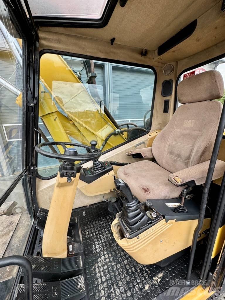 CAT M 315 Колесни екскаватори