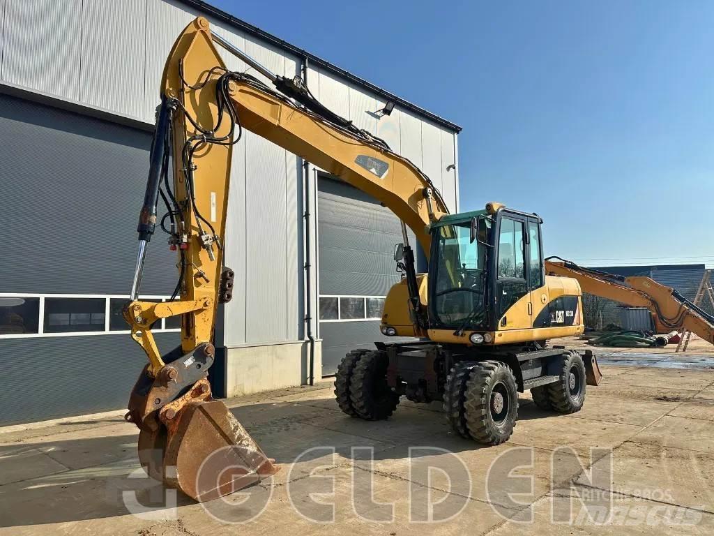 CAT M313D Колесни екскаватори