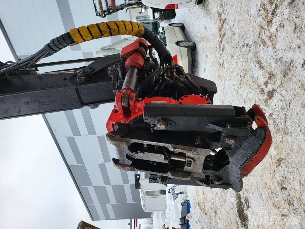Huddig 1260 C Kronos Товарач със заден ексватор