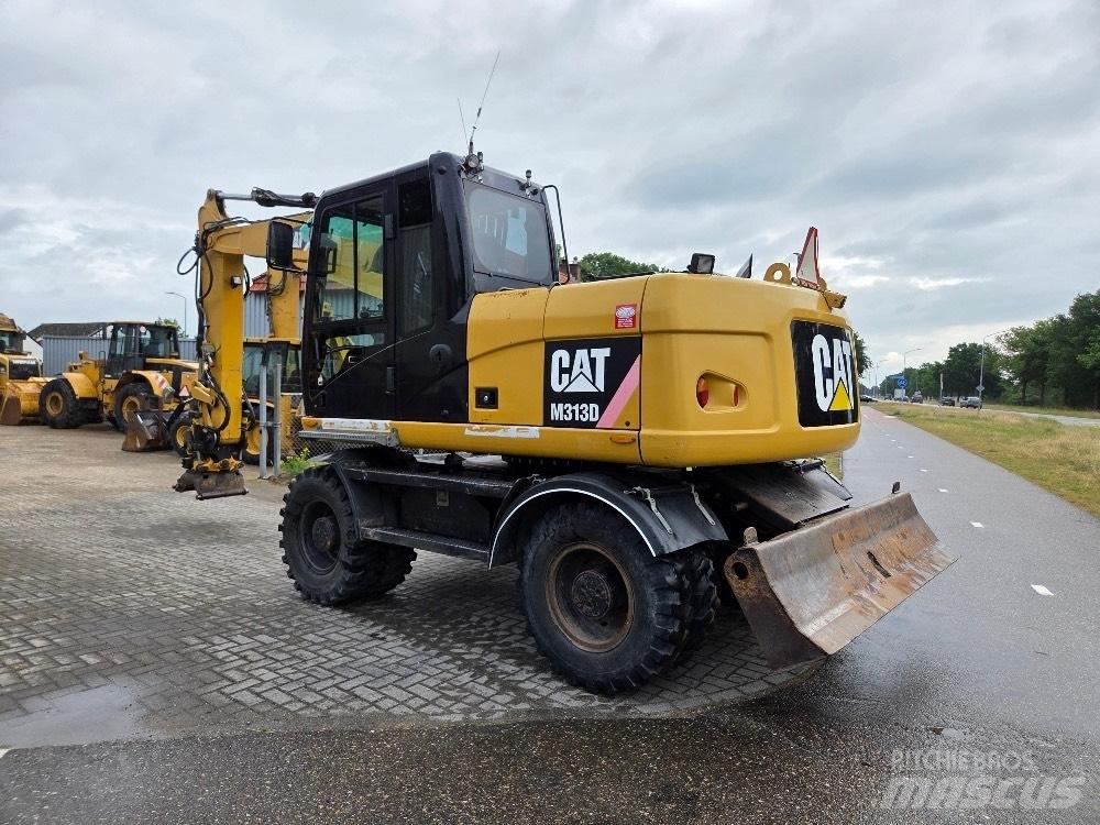 CAT M313D Колесни екскаватори