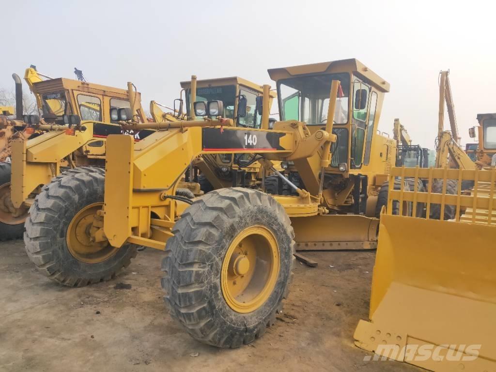 CAT 140K Грейдери