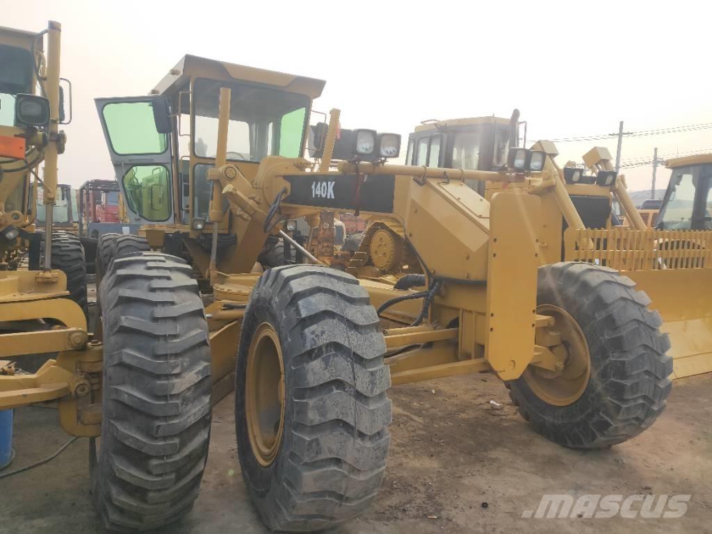 CAT 140K Грейдери