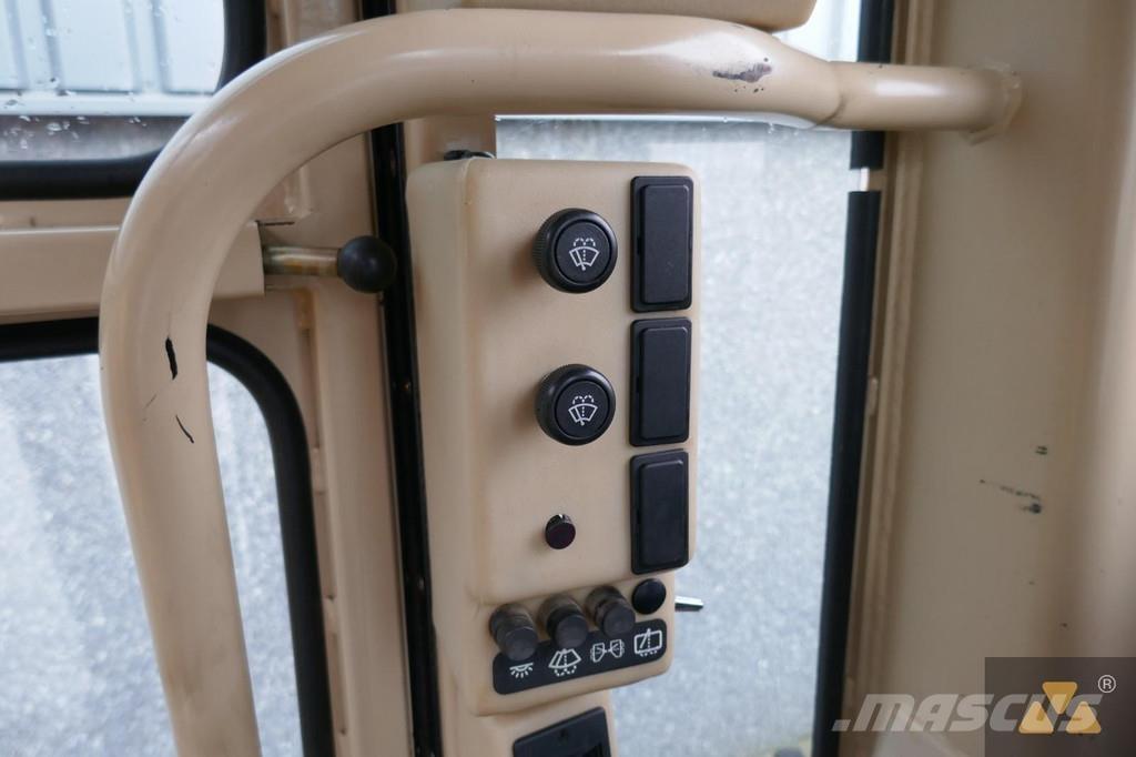 CAT 140H Ex-army Грейдери