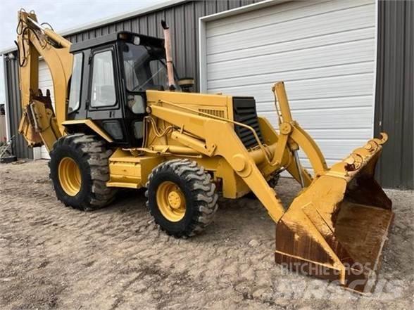CAT 446B Товарач със заден ексватор