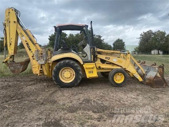 Komatsu WB140 Товарач със заден ексватор