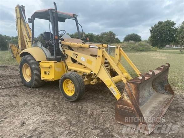 Komatsu WB140 Товарач със заден ексватор