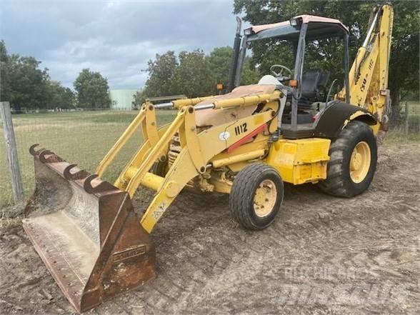 Komatsu WB140 Товарач със заден ексватор
