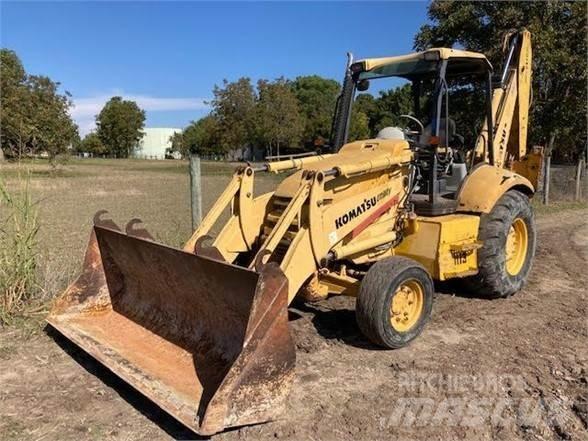 Komatsu WB140 Товарач със заден ексватор