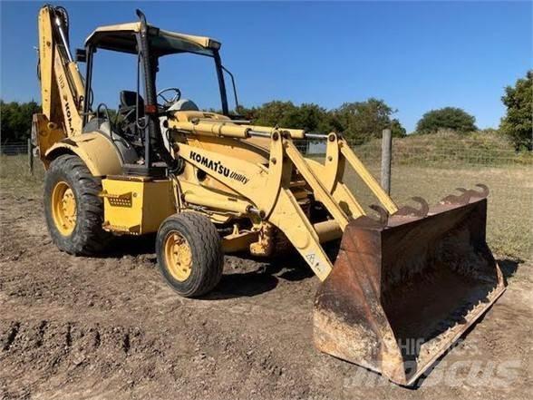 Komatsu WB140 Товарач със заден ексватор