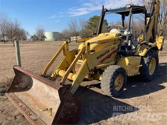 Komatsu WB140 Товарач със заден ексватор