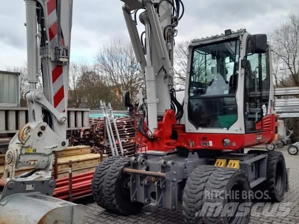 Takeuchi TB 395 W Колесни екскаватори