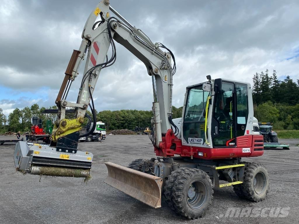 Takeuchi TB 295 W Колесни екскаватори