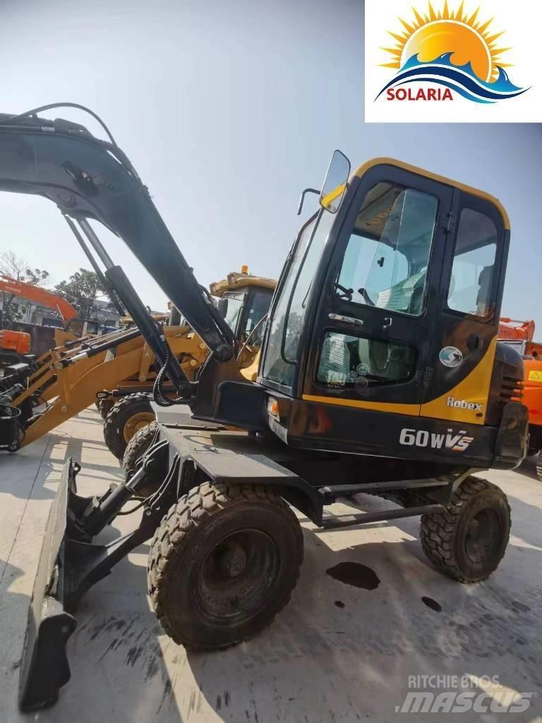 Hyundai R60W vs Мини екскаватори < 7 т
