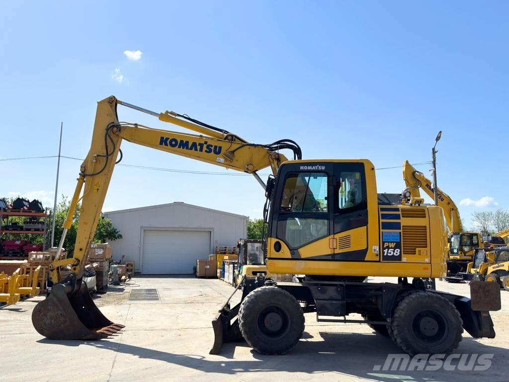 Komatsu PW 158-11 Колесни екскаватори