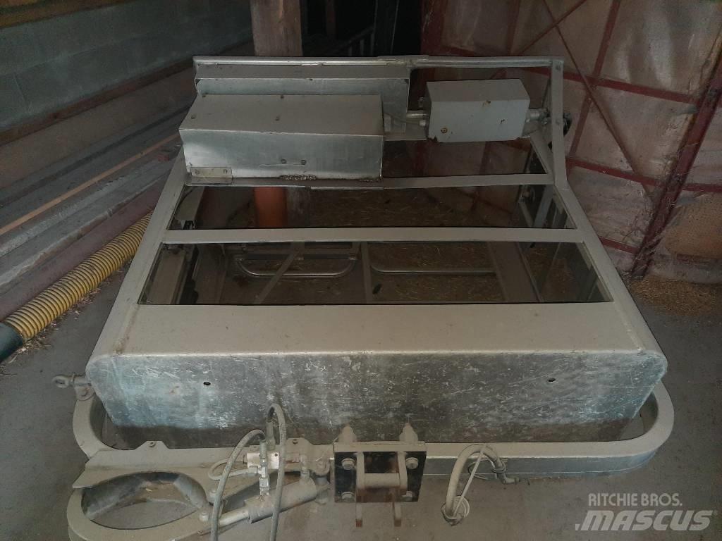 Huddig 1260 Товарач със заден ексватор